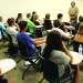 Professor Regis Tucci lecturing incoming freshman at a FYI class. Photo by: Clinton(Buddy)Brown