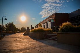 The sun rises behind the University Center Sunday. -Millie Schriebman