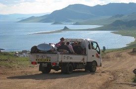 Outdoor Program students travel by truck near White Lake, Mongolia.