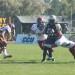 The CMU defense attempts to wrap up a runner on Saturday.