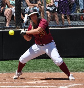 Jessica Severinsen holds on a pitch during her four-home run, seven-RBI performance in CMU's sweep of Chadron.