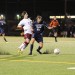 Senior Brandon Burton fights for the ball during Friday night’s 3-1 win over Metro State.