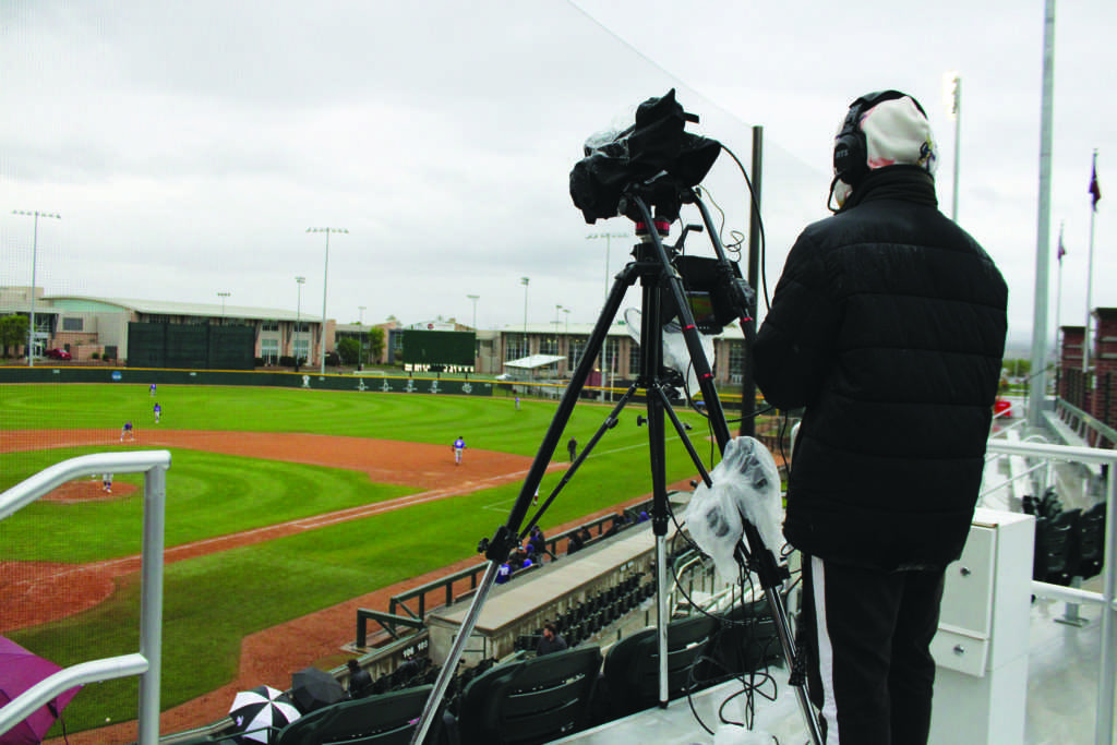 A student employee for Maverick TV operates the 1st base camera angle.  
The broadcast featured four unique camera angles to deliver an engaging broadcast.