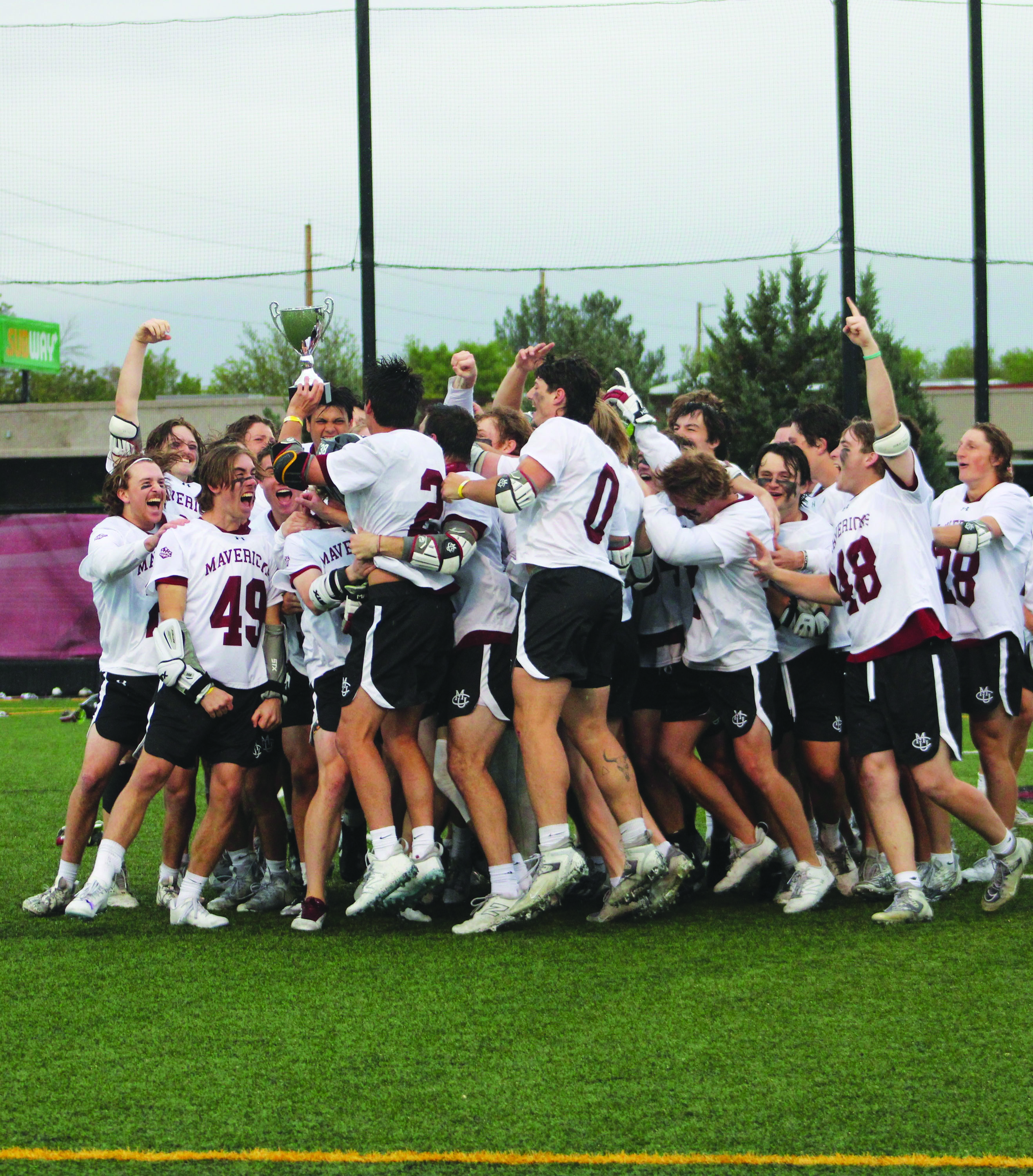 The Mavericks storm the field after their win against Concordia UI after James Steinke scored the game-winning goal in overtim to secure their third straight RMAC Tournament title.  