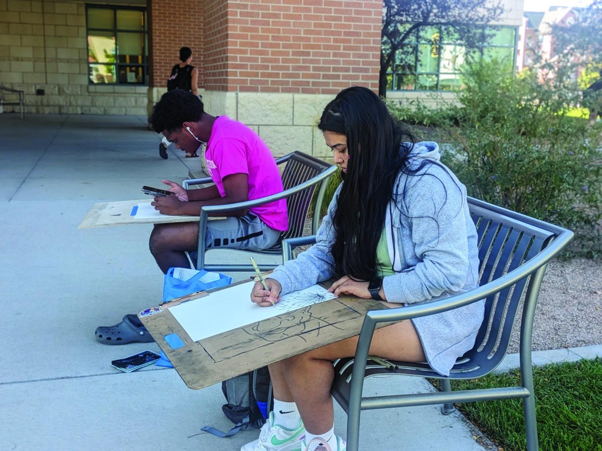 Nursing junior Nikita Thapa and film and animation sophomore Ajilon Reese find inspiration on campus for their artwork . They find value in the process of creating their art. 			