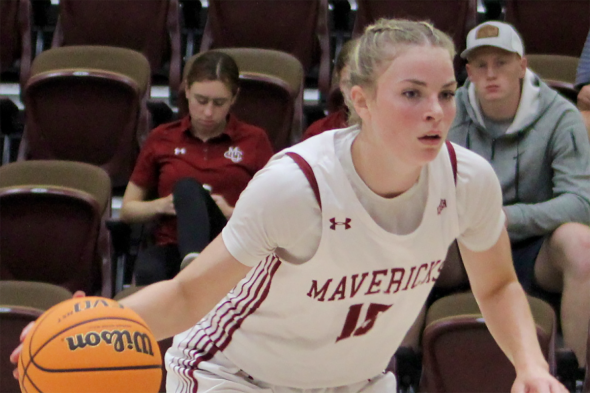 RMAC freshmen of the year guard Mason Rowland looks to dribble inside. After being the sparkplug off the bench last season, Rowland has worked her way into the starting lineup.
