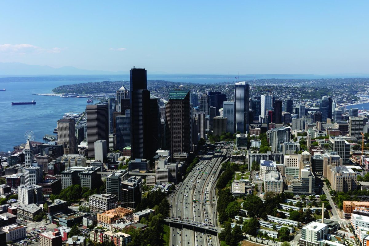 An aerial view of downtown Seattle, bisected by Interstate Highway 5. This is an example of design that doesn't function for all residents. Historic buildings as well as 6.000 homes were demolished to make space in the 1960s. Seattle now has some of the worst traffic congestion in the country and that shouldn't continue.
Image from the Library of Congress.