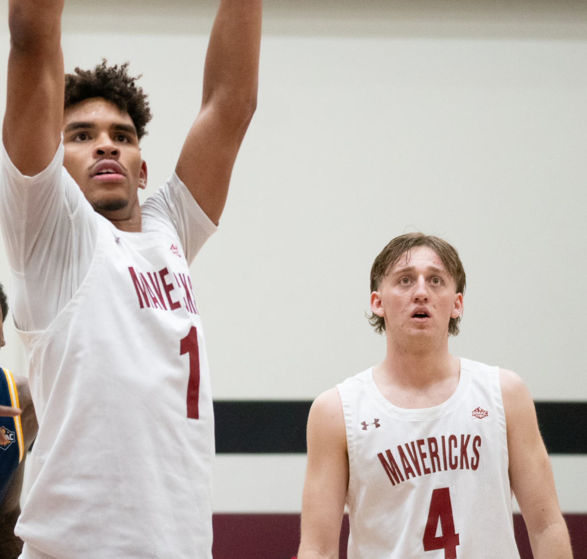 Freshman guard Harvey White looks on as redshirt senior Christopher Speller shoots a free throw. In a Thursday night double overtime win over MSU-Denver, Speller scored 17 points and had six rebounds.
\\ Shelby Streeter for The Criterion