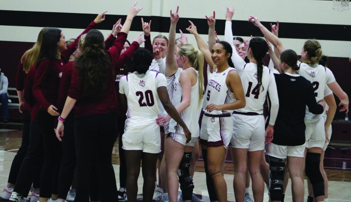 The Colorado Mesa Womens basketball team breaks their post-game huddle after defeating South Dakota Mines, 73-44. The Mavericks won their thirteenth straight game in their annual Blizzard at Brownson game..
\ Jordan Messler for The Criterion