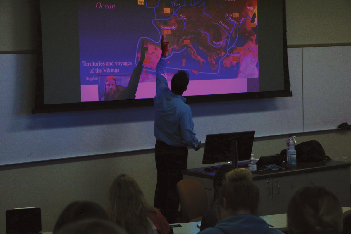 Dr. Winegard lecturing for one of his history classes. Winegard has achieved multiple accomplishments, including the publishing of six books.