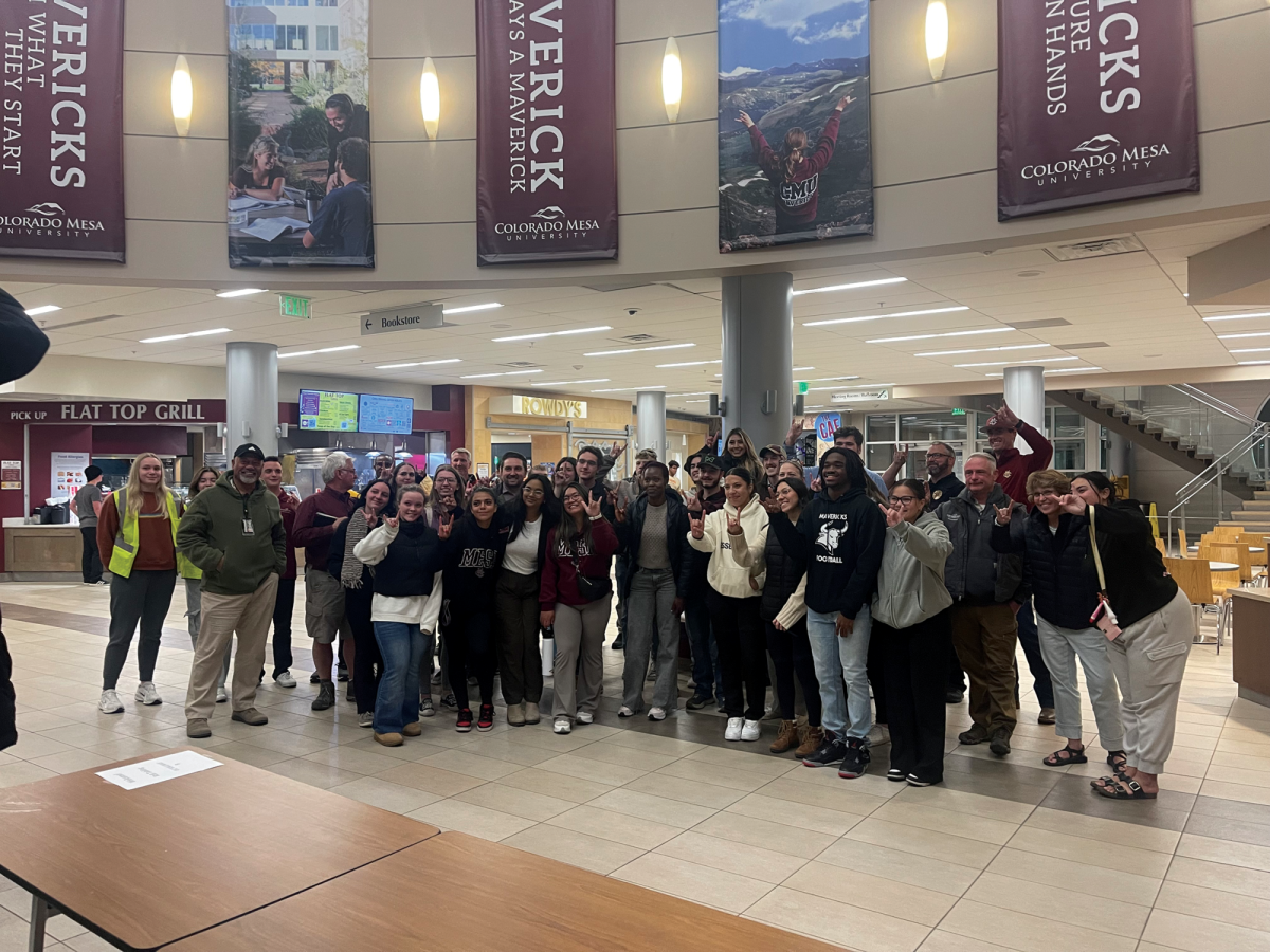 A group photo of this year's annual campus safety walk. The intention of the safety walk is to unite students and faculty in identifying important safety concerns.