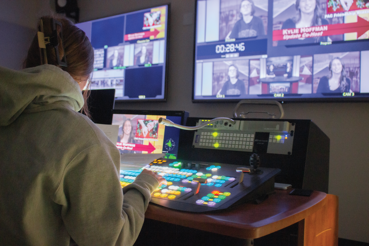 As Sinclair and Hoffman host "The Update," a student behind the scenes operates the switchboard. 
Students can find archived episodes of "The Update" and other programs on YouTube.