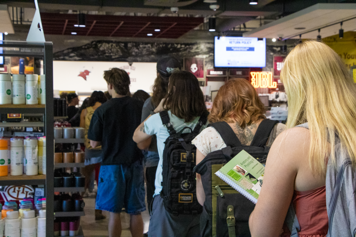 Students wait in line at The Maverick Bookstore on the first day of classes.