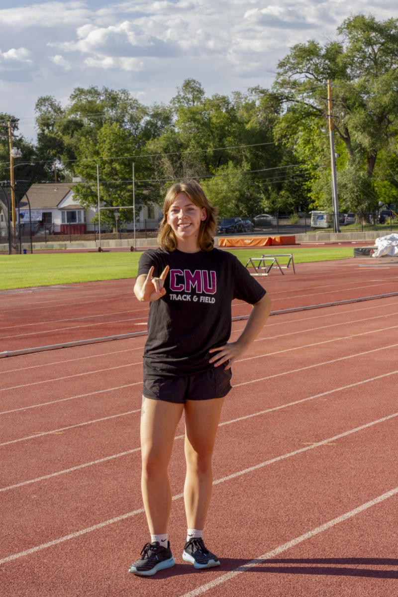 Junior cross country athlete Autumn McQuity poses on the track she spends much of her time on. 