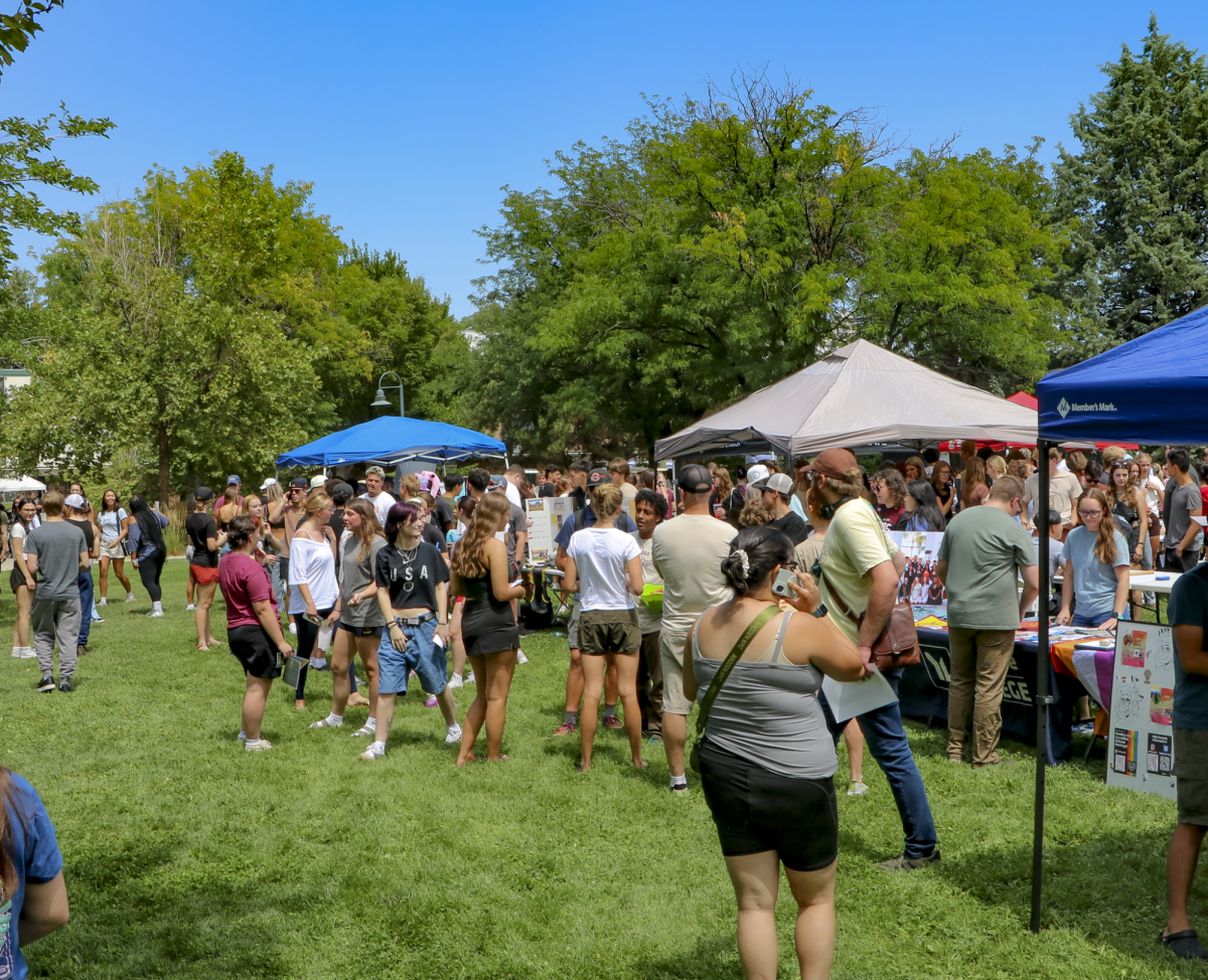 Students, friends and family members gather together on campus for the 2025 club fair.