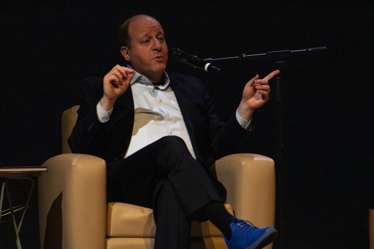 Jared Polis discusses issues facing the Western Slope during an interview with Colorado Public Radio (CPR) reporter Ryan Warner, including immigration concerns, wildfire impacts and traffic concerns on Interstate 70 (I-70) on Sept 9. in the Asteria Theatre.