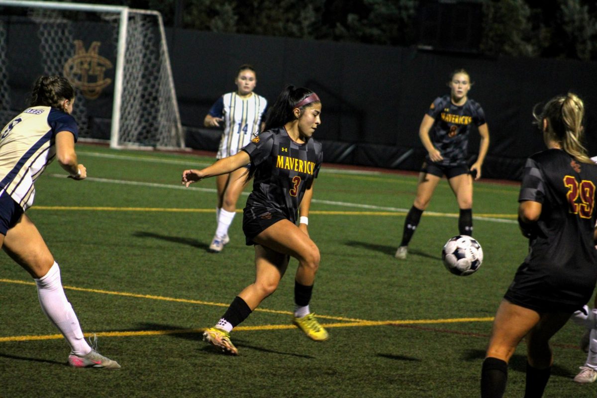 Katie Lozano-Monjaraz (3) sprints down the field in Thursday night’s match versus St. Edwards University. The Mavericks opened their season with a statement, shutting out the Hilltoppers 4-0