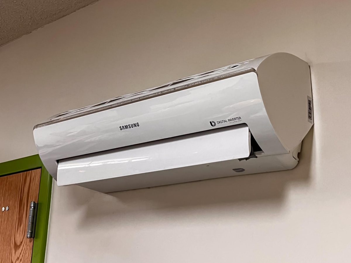 A Samsung air conditioning (AC) unit resides on a dorm room wall in Piñon Hall. Student residents in Piñon Hall report a continuous lack of cold air from the ACs in their dorm rooms.
