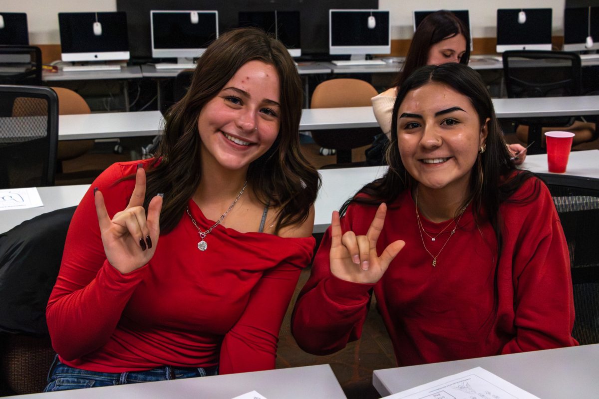 Elaina Vendengna and Halid Garcia sign “I love you.” They are both students at Grand Junction High School (GJHS). ASL students from around the valley and of all skill levels are welcome to attend ASL Club meetings at CMU every other Monday at 7:30 p.m.