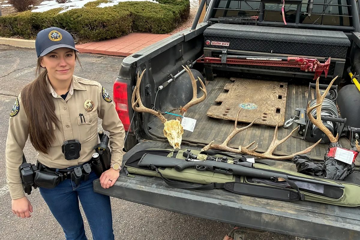 Colorado Parks & Wildlife Officer Demetria Wright pictured next to recovered deer antlers and skull that illegal poachers took as trophies. Thanks to Officer Wright, the poachers are held accountable for their crimes and face $19,000 in fines along with other charges.