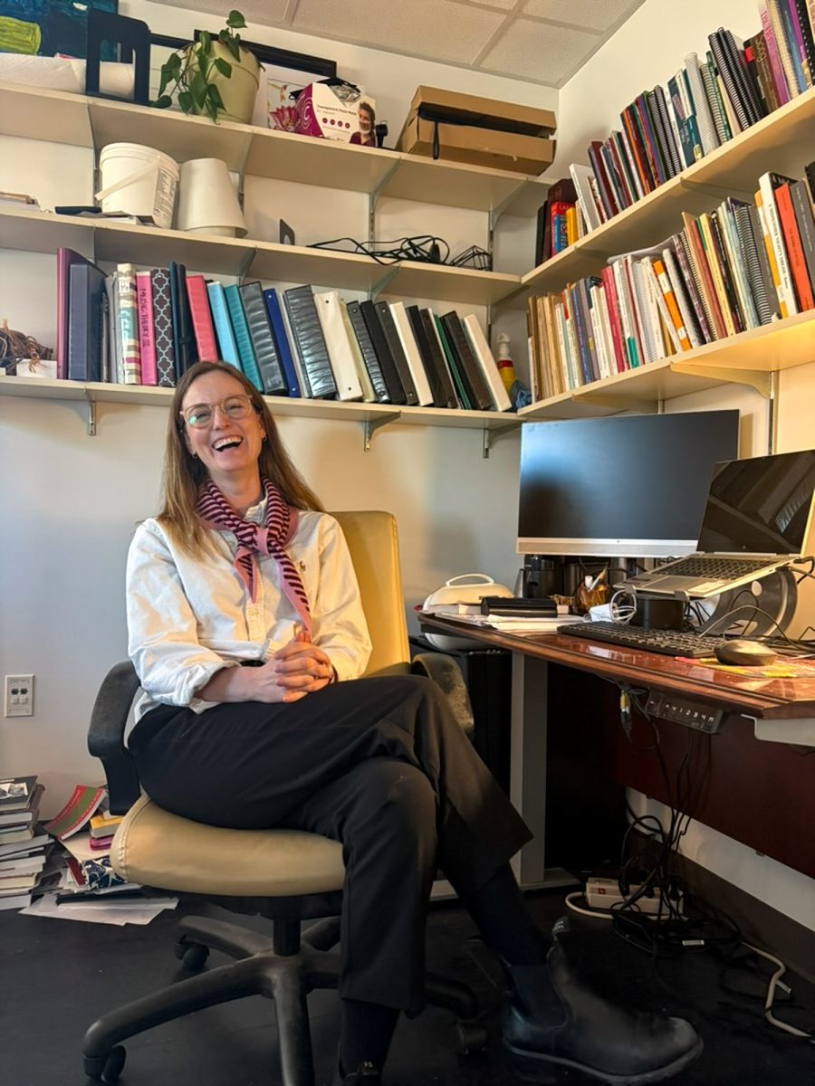 Dr. Caitlin Moore, Assistant Head of Vocal Studies and Interim Assistant Department Head of Music, sits in her office. Moore shared her thoughts with the Criterion regarding the changes the fields of professional vocals and music education have seen as a result of AI.