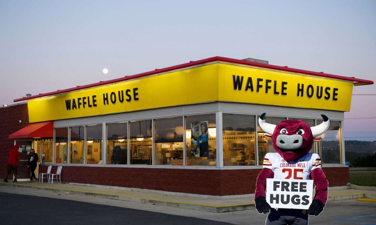 Rowdy stands outside of what could be our Waffle House with a welcoming “free hugs” sign. Maybe one day, we will be blessed with a Waffle House as a community center so everyone can bond over 3 a.m. cigarettes, hashbrowns and parking lot brawls.