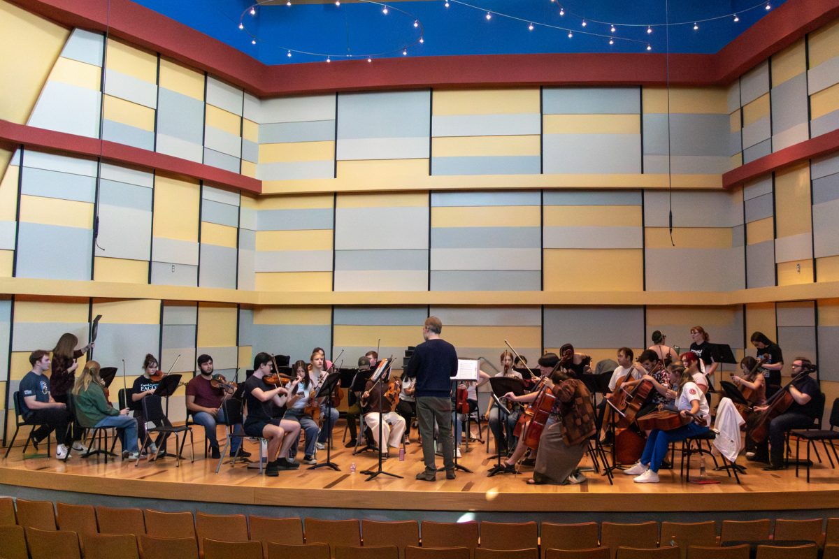 String players rehearse in Love Recital Hall during the fall. The strings join forces with wind, brass and percussion players each spring semester to form a full symphony orchestra and play pieces with more complex textures and larger scopes. They will perform together on May 3 at 3pm in the Asteria Theatre. Tickets are free for students. 