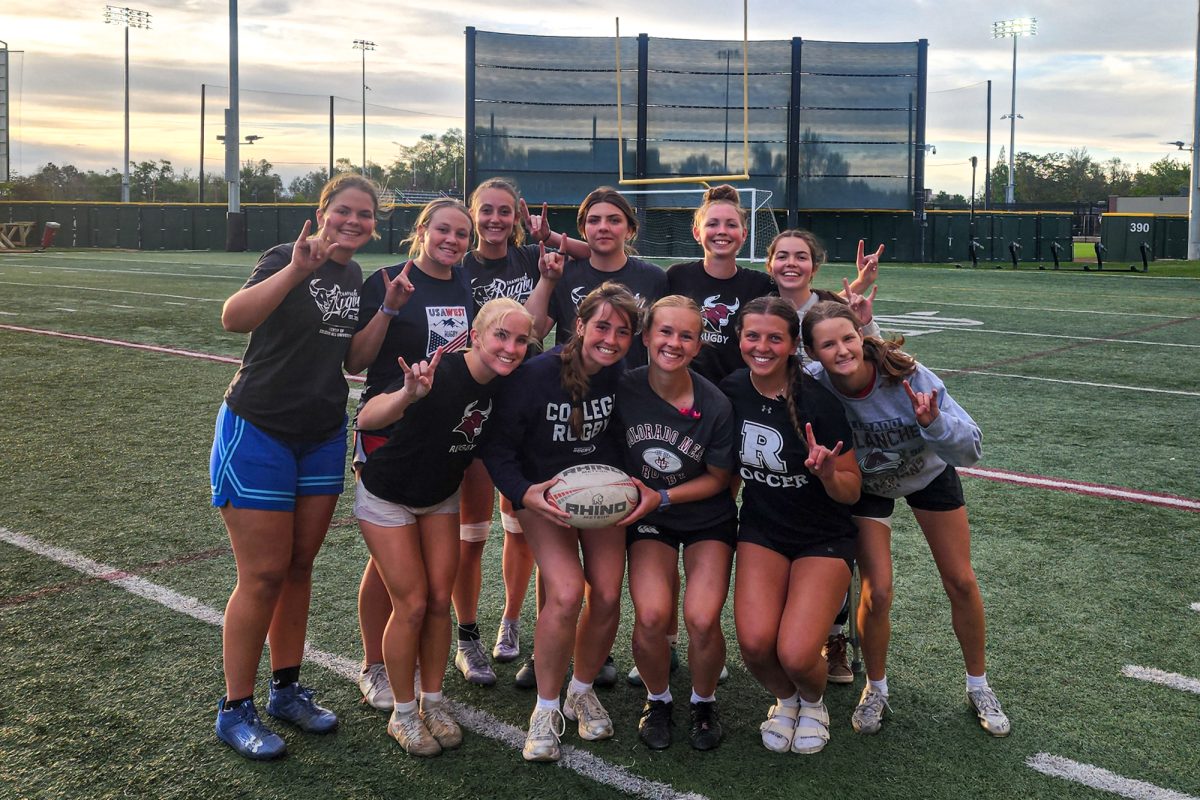 Women’s rugby poses after a Tuesday practice on the practice football field. The rugby pitch is currently under construction through CMU’s Geo-Exchange program, causing practices to be moved. The women’s team won the DII national collegiate rugby on April 24-26 in Boyd, Maryland. 