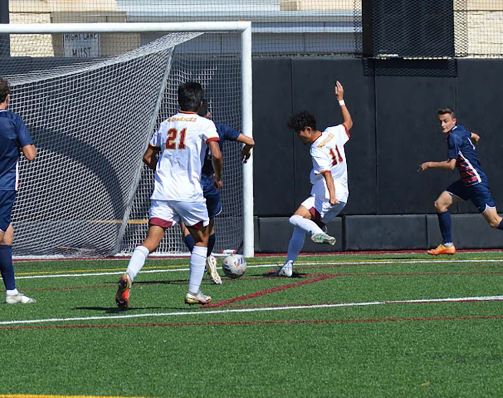 2022 All-Region midfielder Daisuke Takanaka takes a shot on goal against Metro State University Denver on Oct. 9 2022. Takanaka finished his career with 10 goals and 12 assists and was All-RMAC twice.
